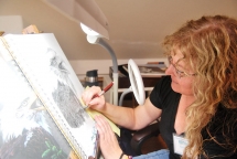 Karla Bailey demonstrates hyper-realism by drawing an American Bald Eagle in graphite pencil